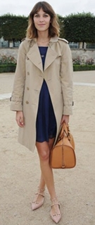 022-alexa-chung-beige-trench-coat-navy-blue-dress-and-pointed-toe-nude-flats